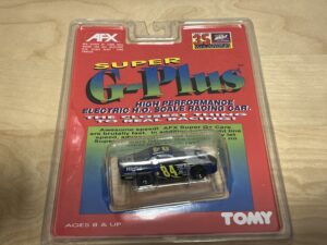 Tomy AFX SG+ #9826 Monte Carlo Stocker blau #84 „Highs Construction“