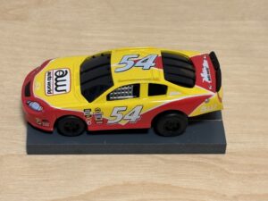 Auto World Super III Nascar #54 gelb/rot