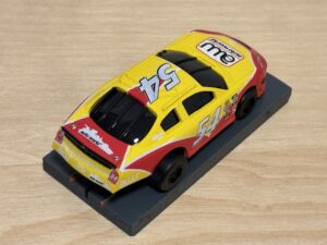 Auto World Super III Nascar #54 gelb/rot