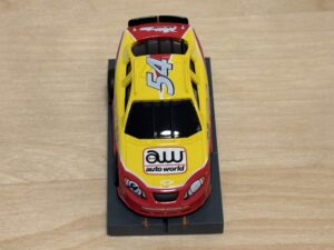 Auto World Super III Nascar #54 gelb/rot