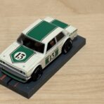 Auto World Datsun 510 weiss/grün #13