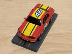 LifeLike/Rokar Stock Car rot/gelb #46 mit Licht