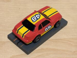 LifeLike/Rokar Stock Car rot/gelb #46 mit Licht