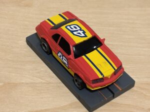 LifeLike/Rokar Stock Car rot/gelb #46 mit Licht