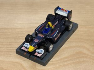 AFX Racing Panoz DP01 #21 "Red Bull" – Neel Jani
