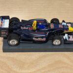 AFX Racing Panoz DP01 #21 "Red Bull" – Neel Jani