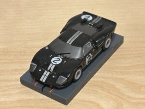 AFX Racing Ford GT40 #2 schwarz, bespielt, Heckschürze fehlt, mit neuem BDR-Chassis