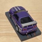 Johnny Lightning Nissan Skyline R34 purple mit BDR-Chassis