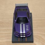 Johnny Lightning Nissan Skyline R34 purple mit BDR-Chassis
