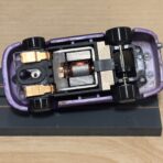 Johnny Lightning Nissan Skyline R34 purple mit BDR-Chassis