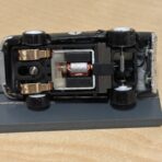 Johnny Lightning Shelby Mustang schwarz/gold #1 mit BDR Chassis