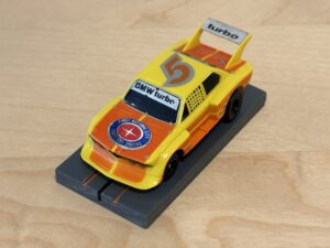 Tomy AFX BMW 320i Gr. 5 gelb #5 mit Licht