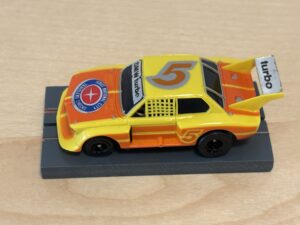 Tomy AFX BMW 320i Gr. 5 gelb mit Licht