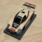 Tomy AFX Jaguar XJR-9 "Castrol" - vergilbt, 1 Licht defekt