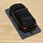 Auto World Dodge Challenger schwarz mit BDR Chassis