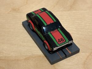 Faller Aurora AFX Ford Escort schwarz/rot/grün #46