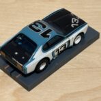 Aurora AFX Capri blau/schwarz #13 mit Box