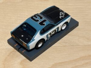 Aurora AFX Capri blau/schwarz #13 mit Box