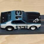 Aurora AFX Capri blau/schwarz #13 mit Box