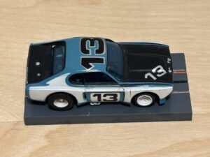 Aurora AFX Capri blau/schwarz #13 mit Box