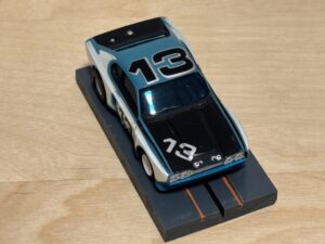 Aurora AFX Capri blau/schwarz #13 mit Box