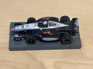Tyco 440x2 McLaren F1 #8 schwarz/silber
