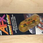 Aurora AFX Speed Shifter Porsche 934 Turbo gelb/orange No. 51 auf Original-Blister