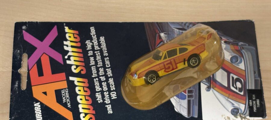 Aurora AFX Speed Shifter Porsche 934 Turbo gelb/orange No. 51 auf Original-Blister