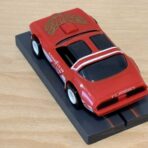Tomy AFX Pontiac Firebird rot mit Bulldog-Chassis