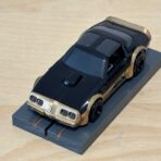 Tomy AFX Pontiac Firebird schwarz "AFX" mit Bulldog-Chassis