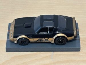 Tomy AFX Pontiac Firebird schwarz "AFX" mit Bulldog-Chassis
