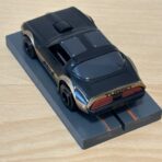 Tomy AFX Pontiac Firebird schwarz "AFX" mit Bulldog-Chassis