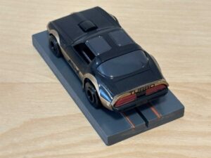 Tomy AFX Pontiac Firebird schwarz "AFX" mit Bulldog-Chassis