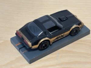 Tomy AFX Pontiac Firebird schwarz "AFX" mit Bulldog-Chassis