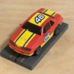 LifeLike/Rokar Stock Car rot/gelb #46 mit Licht