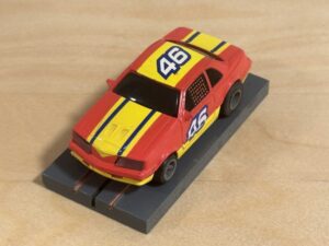 LifeLike/Rokar Stock Car rot/gelb #46 mit Licht