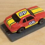 LifeLike/Rokar Stock Car rot/gelb #46 mit Licht