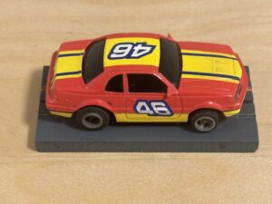 LifeLike/Rokar Stock Car rot/gelb #46 mit Licht